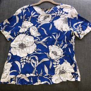 Blue blouse with white flowers